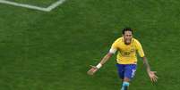 Neymar comemora seu gol na vitória do Brasil sobre o Paraguai por 3 a 0, na Arena Corinthians  Foto: Reuters