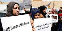 Sírios protestam contra bombardeio americano  Foto: EFE