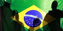 A pesquisa Ibope/Estado/TV Globo divulgada nesta terça-feira, 18, revela que a maioria absoluta dos brasileiros não está disposta a fazer sacrifícios pessoais ou admitir corte de gastos sociais, mesmo que isso sirva para "ajudar o Brasil a sair da crise"  Foto: Reuters