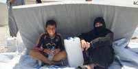 Famílias buscam abrigo no novo acampamento para deslocados do Acnur, no Iraque   Foto: Agência Brasil