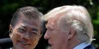 Presidentes dos EUA, Donald Trump, e da Coreia do Sul, Moon Jae-in, falam a jornalistas
30/06/2017
REUTERS/Carlos Barria  Foto: Reuters