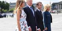 Donald Trump e sua esposa foram convidados de Macron, presidente da França, durante as festividades do Dia da Bastilha, em Paris  Foto: Reuters