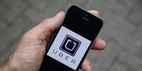 Aplicativo Uber em celular
28/10/2016 REUTERS/Toby Melville/Illustration  Foto: Reuters