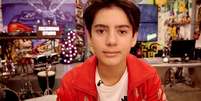 Com apenas 12 anos, Jenk Oz é chefe de um portal criado por ele mesmo   Foto: BBC News Brasil