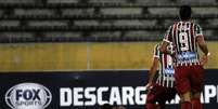 Emoção: Marlon Freitas desabou após marcar contra a Universidad Católica (Foto: Nelson Perez/Fluminense F.C.)  Foto: Lance!