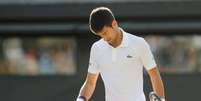 No último grand slam, em Wimbledon, o tenista sérvio acabou abandonando disputa de jogo das quartas de final por causa de lesão  Foto: Reuters