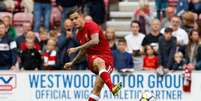 Coutinho em jogo do Liverpool contra o Wigan Athletic
 14/7/2017    Action Images via Reuters/Craig Brough  Foto: Reuters