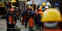 Membro da equipe de resgate argentina trabalha junto aos mexicanos na busca por corpos e sobreviventes  Foto: Reuters