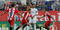 Atacante Portu, do Girona, comemora o gol que marcou na vitória sobre o Real Madrid, pelo Campeonato Espanhol.  Foto: Reuters