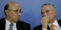 O ministro Henrique Meirelles e o presidente Michel Temer.  Foto: Ueslei Marcelino / Reuters