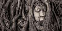 Com formas geométricas, o rosto de Buda lembra uma pintura cubista | Foto: Mathew Browne/Historic Photographer of the Year  Foto: BBC News Brasil