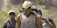 Trabalhador em condição análoga à escravidão volta a fazenda na bacia amazônica 22/09/2003 REUTERS/Rickey Rogers 
  Foto: Reuters