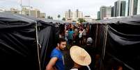 Movimentos de esquerda já estão acampados em Porto Alegre  Foto: Reuters / BBC News Brasil