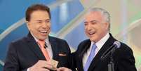 Silvio Santos ganhou R$ 50 de Michel Temer, no programa deste domingo, 28 de janeiro de 2018: 'Vou passar um dinheiro para você!'  Foto: Divulgação, SBT / PurePeople