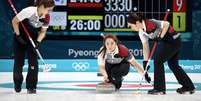 Equipe da Coreia do Sul em partida de Curling nos Jogos Olímpicos de Inverno 2018.  Foto: Chris Graythen / Getty Images