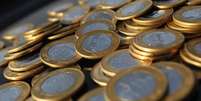 Moedas de um real em ilustra&ccedil;&atilde;o
15/10/2010 REUTERS/Bruno Domingos  Foto: Reuters