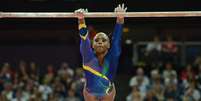 Daiane dos Santos, em 2004, foi a primeira ginasta brasileira conquistar uma medalha de ouro em uma edição do Mundial. Sua importância é tão grande que dois movimentos do esporte foram batizado com seu nome.  Foto: AFP / LANCE!