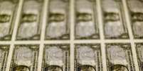 Notas de um dólar dos EUA fotografadas em Washington, EUA
14/11/2014
REUTERS/Gary Cameron/File Photo   Foto: Reuters