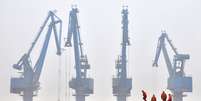 Minério de ferro é visto em porto em Tianjin, na China 29/03/2010 REUTERS/Vincent Du  Foto: Reuters