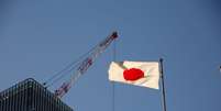 Bandeira do Japão é vista em distrito comercial em Tóquio 05/01/2017 REUTERS/Kim Kyung-Hoon   Foto: Reuters