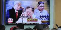 Donald Trump, Moon Jae-in e Kim Jong-un na TV sul-coreana  Foto: DW / Deutsche Welle