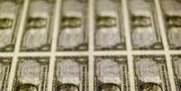Notas de d&oacute;lar dos EUA fotografados em Washington, EUA
14/11/2014
REUTERS/Gary Cameron  Foto: Reuters