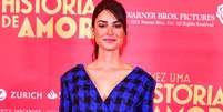 Thaila Ayala investiu em vestido com ombreira e botões para lançar o filme 'Talvez Uma História de Amor'  Foto: AGNews / PurePeople