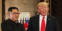 Presidente dos EUA, Donald Trump, e líder norte-coreano, Kim Jong Un, em Cingapura 12/06/2018  REUTERS/Jonathan Ernst  Foto: Reuters