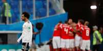 Salah lamenta enquanto time da Rússia comemora  Foto: Lee Smith / Reuters