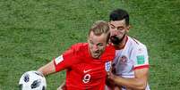 Inglês Harry Kane e tunisiano Yassine Meriah 18/06/2018   REUTERS/Gleb Garanich  Foto: Reuters