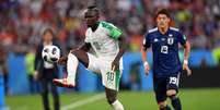 Principal jogador da seleção senegalesa, Mané marcou o primeiro gol da partida contra o Japão, pela segunda rodada (Foto: AFP/HECTOR RETAMAL)  Foto: Lance!