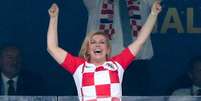 As imagens de Kolinda Grabar-Kitarović comemorando de forma efusiva na Copa correram o mundo  Foto: Getty Images / BBC News Brasil