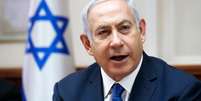 Netanyahu elogiou a aprovação da lei. Ao ser questionado sobre se a legislação retiraria direitos de israelenses árabes, ele afirmou que a "maioria também tem direitos e a maioria decide"  Foto: AFP / BBC News Brasil