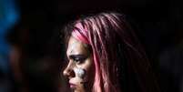 Mulher com s&iacute;mbolo das mulheres desenhado no rosto durante protesto em Buenos Aires, Argentina 08/03/2018 REUTERS/Marcos Brindicci   Foto: Reuters