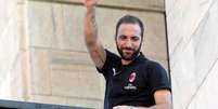 Higua&iacute;n &eacute; apresentado pelo Milan e mira t&iacute;tulos na temporada  Foto: ANSA / Ansa - Brasil