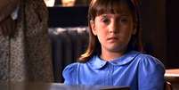 Personagem Matilda, interpretada por Mara Wilson, em cena do filme de 1996.  Foto: Reprodução de cena de 'Matilda' (1996) / Tristar Pictures / Estadão