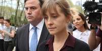 Allison Mack  é fotografada deixando o Tribunal de Distrito Leste dos Estados Unidos em Nova York, em maio de 2018  Foto: Jemal Countess / Getty Images 