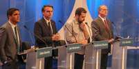 Presidenciáveis durante debate na sexta-feita, 18, exibido pela RedeTV!  Foto: Guilherme Rodrigues/Futura Press / Estadão