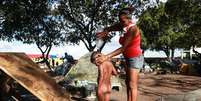 Venezuelanos espalhados pela Praça Simon Bolívar em Boa Vista, Roraima  Foto: Werther Santana / Estadão Conteúdo