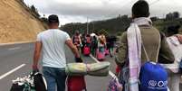 Venezuelanos passam por estrada equatoriana para chegar ao Peru
 21/8/2018    REUTERS/Andres Rojas   Foto: Reuters
