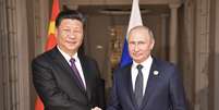 Presidente da Rússia, Vladimir Putin, e presidente da China, Xi Jinping 26/07/2018 Sputnik/Alexei Nikolsky/Kremlin via Reuters  Foto: Reuters