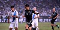 Simeone tenta uma jogada durante o amistoso entre Argentina e Guatemala  Foto: Harry How / Getty Images