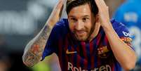 Messi em jogo do Barcelona contra o Valencia   Foto: Heino Kalis / Reuters