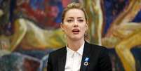 Amber Heard fala em Genebra  Foto: Pierre Albouy  / Reuters