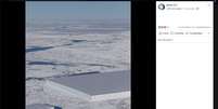 Fotografia mostra um iceberg plano e retangular  Foto: Reprodução/Facebook / Estadão