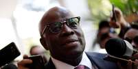 O ex-presidente do STF Joaquim Barbosa antes de reunião em Brasília  Foto: Ueslei Marcelino / Reuters