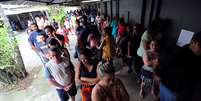 Pessoas fazem fila para votar em segundo turno das elei&ccedil;&otilde;es no Rio de Janeiro 28/10/2018 REUTERS/Sergio Moraes   Foto: Reuters