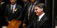 Em sua primeira ida ao Congresso Nacional, em Brasília, presidente eleito, Jair Bolsonaro, participa de sessão especial conjunta do Senado Federal e da Câmara dos Deputados, em comemoração aos 30 anos de promulgação da Constituição Federal (06/11/2018)  Foto: WALTERSON ROSA/FRAMEPHOTO / Estadão Conteúdo