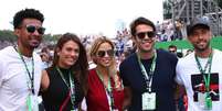 Leandrinho ao lado da mulher, Talita Rocca, Kaká com a namorada, Carol Dias, e o são-paulino Nenê  Foto: Beto Issa/GP Brasil F1 2018