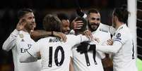 Jogadores comemoram gol de Lucas Vázquez, o segundo do Real Madrid (Foto: AFP)  Foto: LANCE!